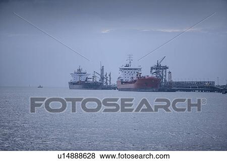 Oil tankers at sea terminal View Large Photo Image Stock Photo - Oil tankers at sea terminal. Fotosearch