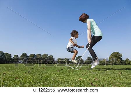 Older woman playing with granddaughter View Large Photo Image Stock Photography - Older woman playing with granddaughter. Fotosearch