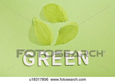 Stock Photograph - Paper cut out of Green with leaves. Fotosearch