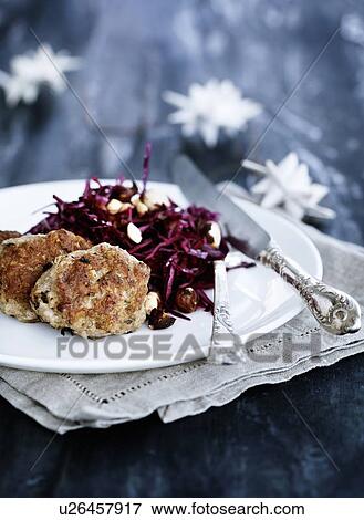 Stock Photo - Plate of meatballs and salad. Fotosearch