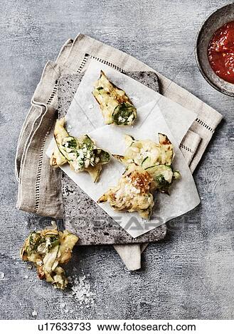 Plate of zucchini fritters with dip View Large Photo Image Stock Image - Plate of zucchini fritters with dip. Fotosearch