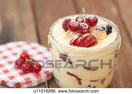 Pot of custard with fruit View Large Photo Image Stock Photograph - Pot of custard with fruit. Fotosearch