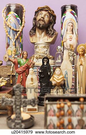 Stock Photo - Religious icons and crosses on table. Fotosearch