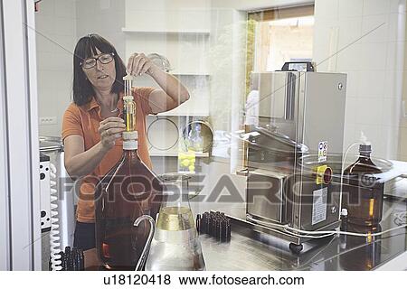 Scientist working in lab View Large Photo Image Stock Photo - Scientist working in lab. Fotosearch