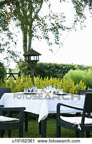 Set table in backyard View Large Photo Image Stock Image - Set table in backyard. Fotosearch