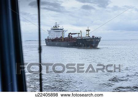 Ship sailing on sea View Large Photo Image Stock Photo - Ship sailing on sea. Fotosearch