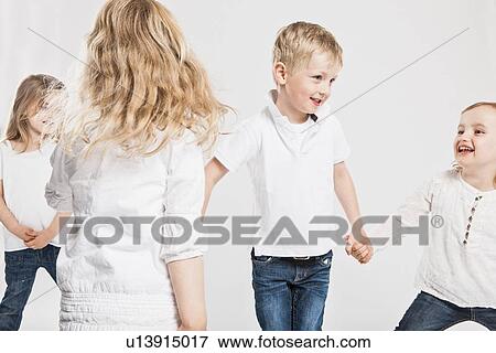 Smiling children playing together View Large Photo Image Stock Photo - Smiling children playing together. Fotosearch