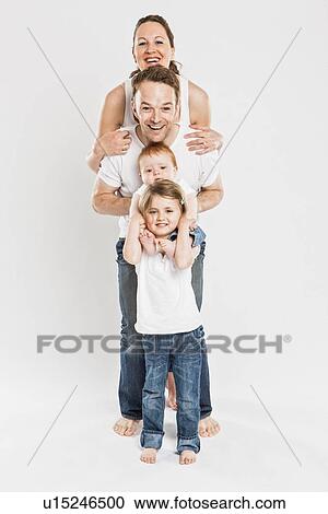 Stock Image - Smiling children posing together. Fotosearch