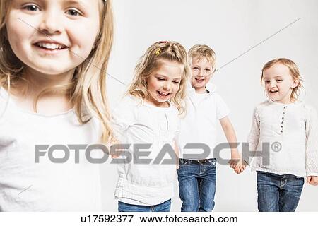 Stock Photo - Smiling children posing together. Fotosearch
