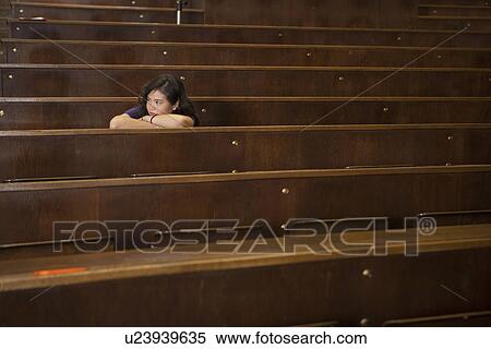 Student resting head on desk in class View Large Photo Image Stock Photography - Student resting head on desk in class. Fotosearch