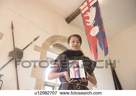 Stock Photo - Student taking picture with computer. Fotosearch