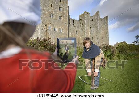 Stock Photography - Student taking picture with computer. Fotosearch