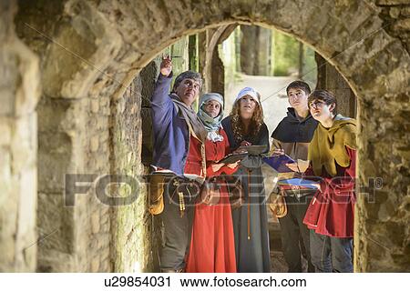 Students examining medieval castle View Large Photo Image Stock Image - Students examining medieval castle. Fotosearch