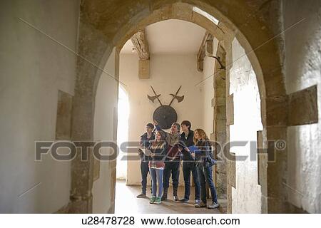 Students examining medieval castle View Large Photo Image Stock Photo - Students examining medieval castle. Fotosearch
