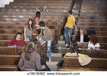 Students lounging in classroom View Large Photo Image Stock Image - Students lounging in classroom. Fotosearch
