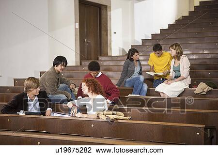 Students lounging in classroom View Large Photo Image Stock Image - Students lounging in classroom. Fotosearch