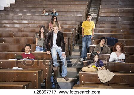 Students lounging in classroom View Large Photo Image Stock Photo - Students lounging in classroom. Fotosearch