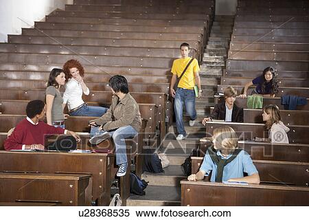 Students lounging in classroom View Large Photo Image Stock Photography - Students lounging in classroom. Fotosearch