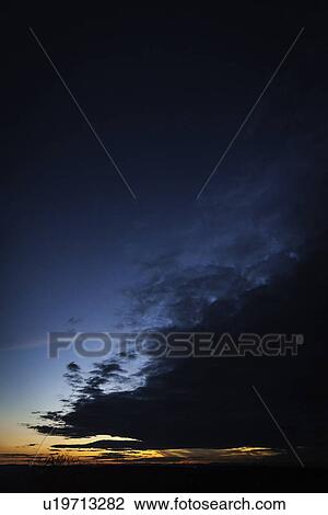 Sun setting over rural landscape View Large Photo Image Stock Image - Sun setting over rural landscape. Fotosearch