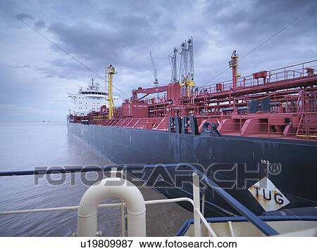 Tanker ship seen from tugboat View Large Photo Image Stock Photo - Tanker ship seen from tugboat. Fotosearch