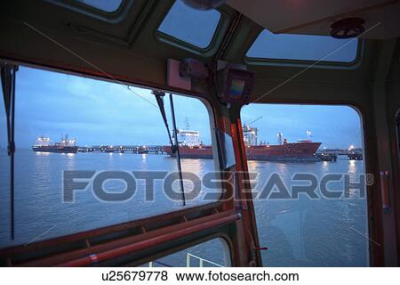 Tanker ships as seen from tugboat View Large Photo Image Stock Photo - Tanker ships as seen from tugboat. Fotosearch