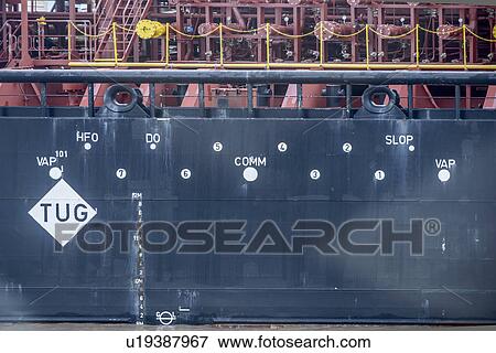 Stock Photo - Tugboat exterior markings on hull. Fotosearch