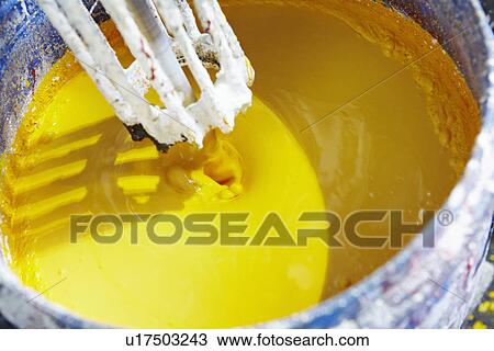 Vat of yellow paint being mixed View Large Photo Image Stock Image - Vat of yellow paint being mixed. Fotosearch