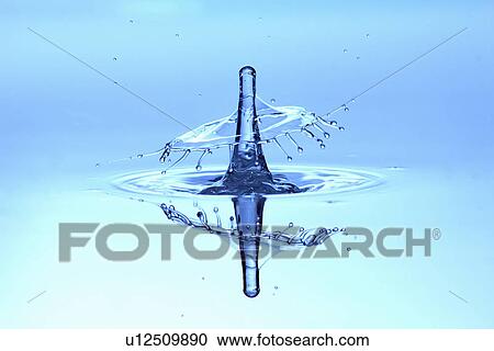 Stock Image - Water drop splashing in pool. Fotosearch