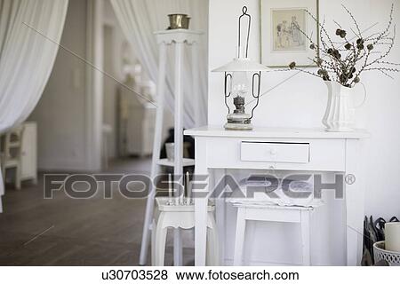 White lantern and desk with stool View Large Photo Image Stock Photo - White lantern and desk with stool. Fotosearch