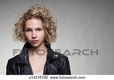 Woman wearing leather jacket View Large Photo Image Stock Image - Woman wearing leather jacket. Fotosearch