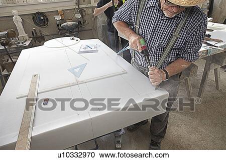 Worker chiseling slab of stone View Large Photo Image Stock Image - Worker chiseling slab of stone. Fotosearch