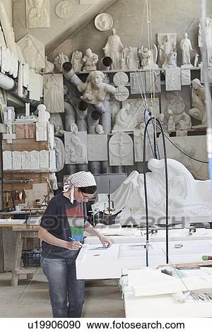 Worker marking slab of stone View Large Photo Image Stock Image - Worker marking slab of stone. Fotosearch