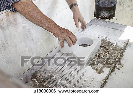 Worker pulling cut stone from block View Large Photo Image Stock Photograph - Worker pulling cut stone from block. Fotosearch