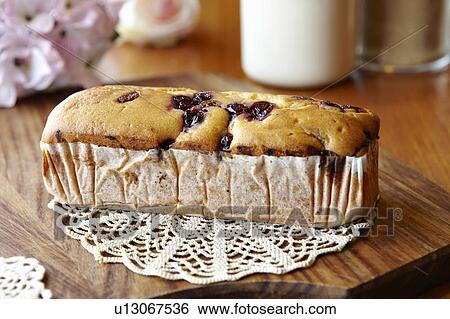 Baked fruit cake on table View Large Photo Image Stock Photograph - Baked fruit cake on table. Fotosearch