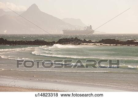 Stock Photo - Barge in foggy rural bay. Fotosearch