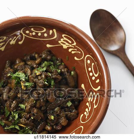 Stock Photography - Bowl of beans with herbs. Fotosearch