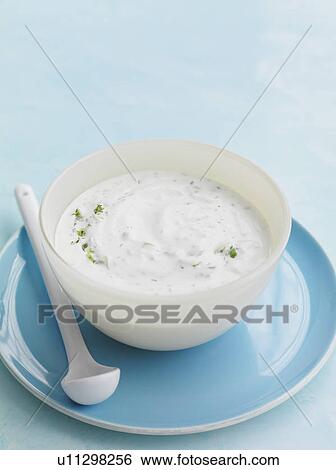 Bowl of herber yogurt with spoon View Large Photo Image Stock Photograph - Bowl of herber yogurt with spoon. Fotosearch