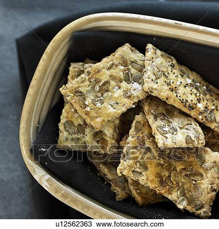 Bowl of whole grain crackers View Large Photo Image Stock Image - Bowl of whole grain crackers. Fotosearch