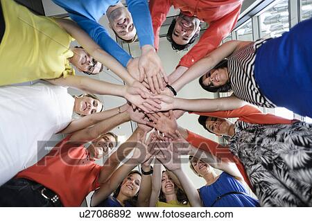 Business people cheering in office View Large Photo Image Stock Image - Business people cheering in office. Fotosearch
