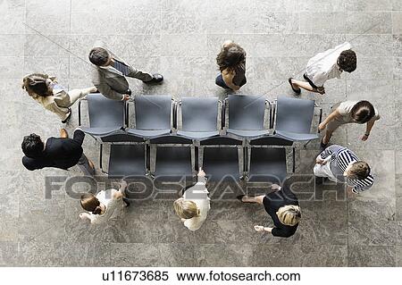 Business people playing musical chairs View Large Photo Image Stock Photography - Business people playing musical chairs. Fotosearch