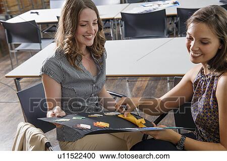 Business people with fabric swatches View Large Photo Image Stock Image - Business people with fabric swatches. Fotosearch