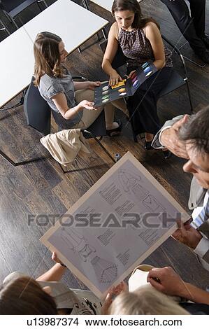 Picture - Business people working in office. Fotosearch