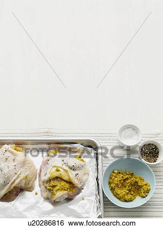 Chickens with marinade on tray View Large Photo Image Stock Photograph - Chickens with marinade on tray. Fotosearch