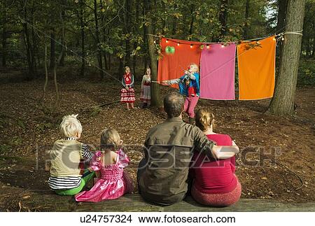 Picture - Childrens theater improvised in woods. Fotosearch
