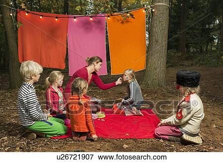 Stock Photo - Childrens theater improvised in woods. Fotosearch
