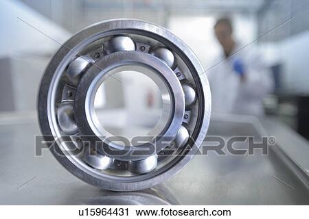 Stock Image - Cleaned part in ultrasonics lab. Fotosearch