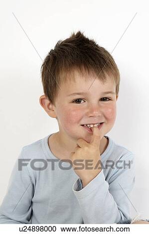Close up of boys smiling face View Large Photo Image Stock Image - Close up of boys smiling face. Fotosearch