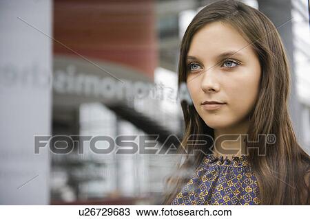 Stock Image - Close up of businesswomans face. Fotosearch