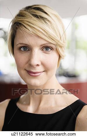 Close up of businesswomans smiling face View Large Photo Image Stock Photography - Close up of businesswomans smiling face. Fotosearch
