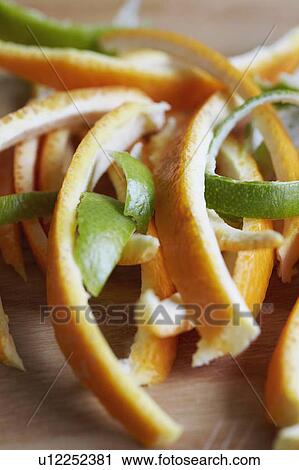 Stock Image - Close up of citrus peels. Fotosearch